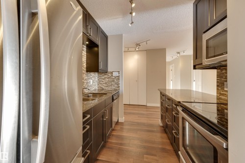 406 12141 Jasper Avenue, Edmonton, AB - Indoor Photo Showing Kitchen With Double Sink With Upgraded Kitchen