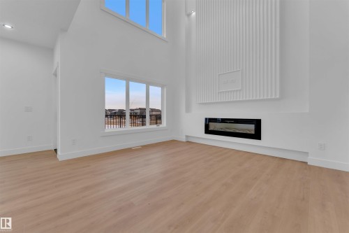 230 Linden Loop, Leduc, AB - Indoor Photo Showing Living Room With Fireplace
