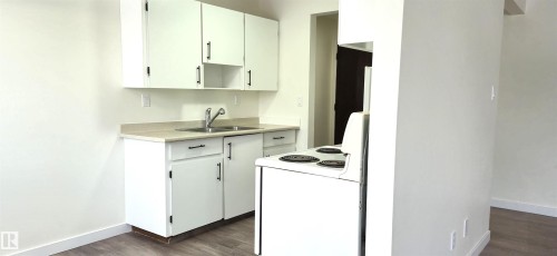 201 11907 81 Street, Edmonton, AB - Indoor Photo Showing Kitchen With Double Sink