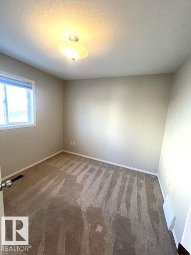 12 303 Leger Way, Edmonton, AB - Indoor Photo Showing Other Room