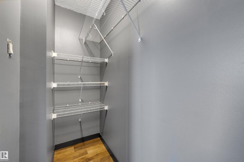 Bedroom walk in closet - 1702 10150 117 Street, Edmonton, AB - Indoor With Storage