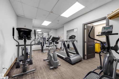 Workout area with a paneled ceiling - 1702 10150 117 Street, Edmonton, AB - Indoor Photo Showing Gym Room