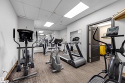 Workout area with a paneled ceiling - 