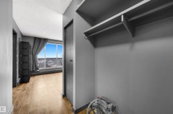 Entry closet featuring wood-style flooring - 