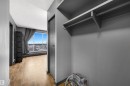 Entry closet featuring wood-style flooring - 1702 10150 117 Street, Edmonton, AB  - Indoor Photo Showing Other Room 