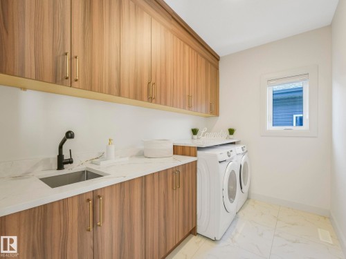 62 Fenwyck Boulevard, Spruce Grove, AB - Indoor Photo Showing Laundry Room