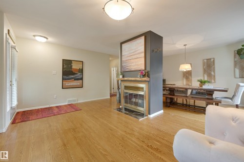 10615 134 Street, Edmonton, AB - Indoor Photo Showing Living Room With Fireplace