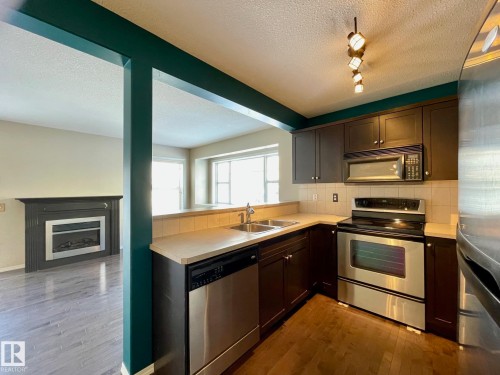 78 230 Edwards Drive Sw, Edmonton, AB - Indoor Photo Showing Kitchen With Double Sink