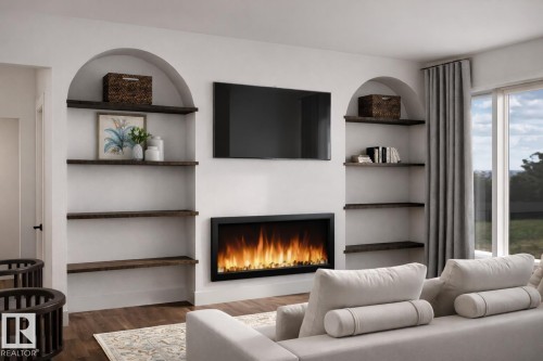 Living area featuring built in shelves, dark wood-style floors, and a lit fireplace - 9237 102 Street, Morinville, AB - Indoor Photo Showing Living Room With Fireplace