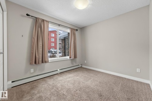 104 2207 44 Avenue Nw, Edmonton, AB - Indoor Photo Showing Other Room