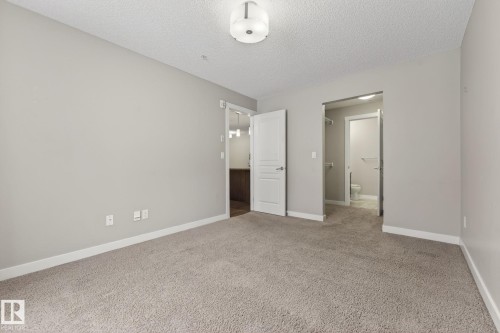 104 2207 44 Avenue Nw, Edmonton, AB - Indoor Photo Showing Other Room