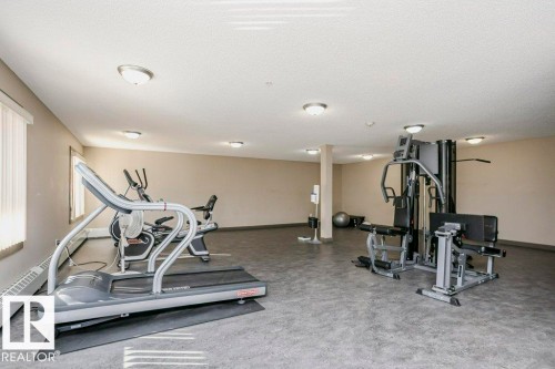 104 2207 44 Avenue Nw, Edmonton, AB - Indoor Photo Showing Gym Room