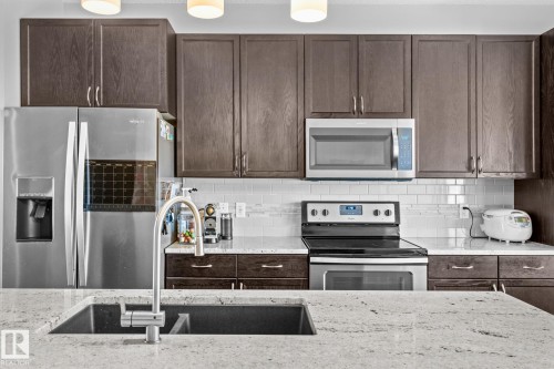 219 42 Avenue, Edmonton, AB - Indoor Photo Showing Kitchen With Stainless Steel Kitchen With Double Sink With Upgraded Kitchen
