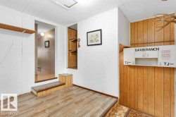 Hall with wooden walls and wood finished floors - 