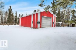 View of snow covered garage - 