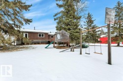 Snow covered playground with a playground - 