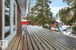 Deck featuring a playground and french doors - 