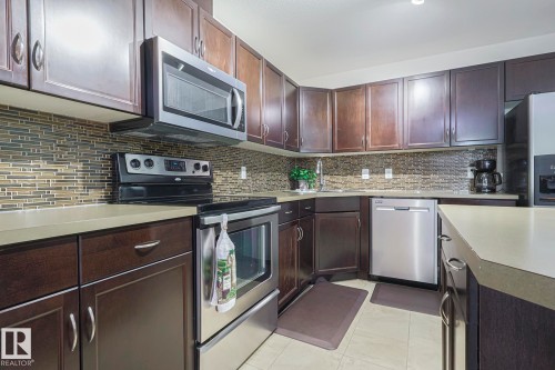 120 7909 71 Street, Edmonton, AB - Indoor Photo Showing Kitchen With Stainless Steel Kitchen With Upgraded Kitchen
