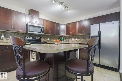 120 7909 71 Street, Edmonton, AB - Indoor Photo Showing Kitchen With Stainless Steel Kitchen
