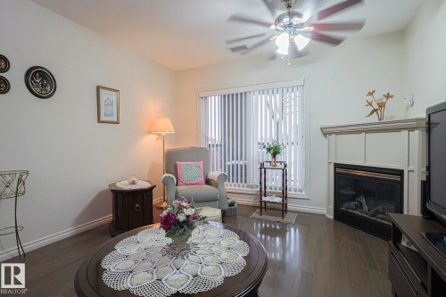 120 7909 71 Street, Edmonton, AB - Indoor Photo Showing Living Room With Fireplace