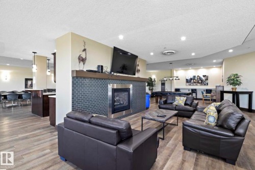120 7909 71 Street, Edmonton, AB - Indoor Photo Showing Living Room With Fireplace