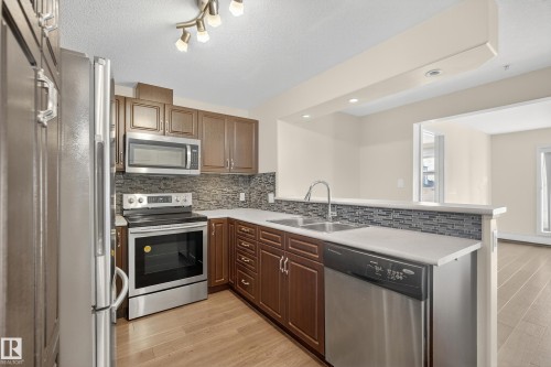 343 11505 Ellerslie Road, Edmonton, AB - Indoor Photo Showing Kitchen With Double Sink