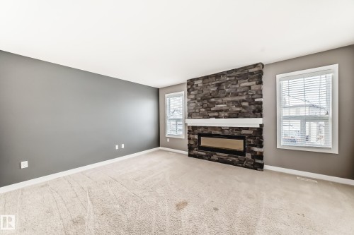 3620 167B Avenue, Edmonton, AB - Indoor Photo Showing Living Room With Fireplace