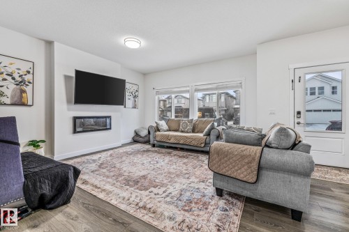 34 Eden Link, Fort Saskatchewan, AB - Indoor Photo Showing Living Room With Fireplace