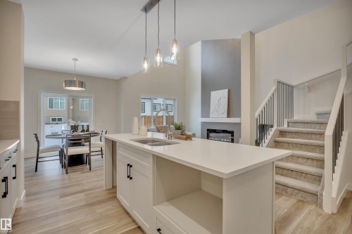 304 Juniper Cove, Leduc, AB - Indoor Photo Showing Kitchen With Double Sink
