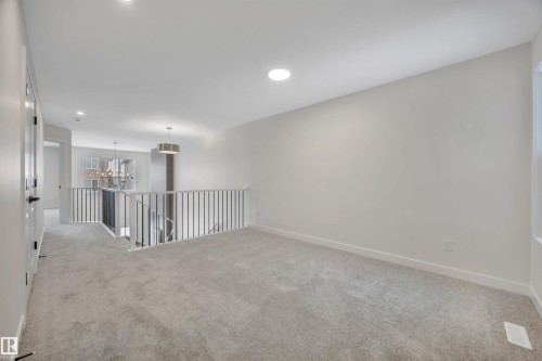 304 Juniper Cove, Leduc, AB - Indoor Photo Showing Other Room