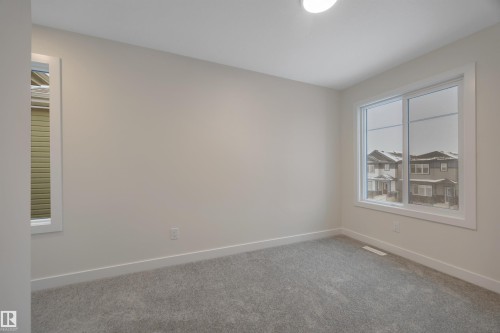 304 Juniper Cove, Leduc, AB - Indoor Photo Showing Other Room