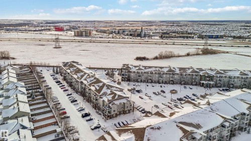 View of snowy aerial view - 2117 9357 Simpson Drive, Edmonton, AB - Outdoor With View