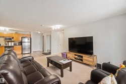 Living room featuring a textured ceiling - 
