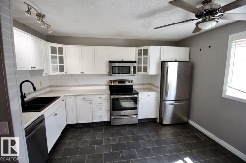 95 8930 99 Avenue, Fort Saskatchewan, AB - Indoor Photo Showing Kitchen With Double Sink