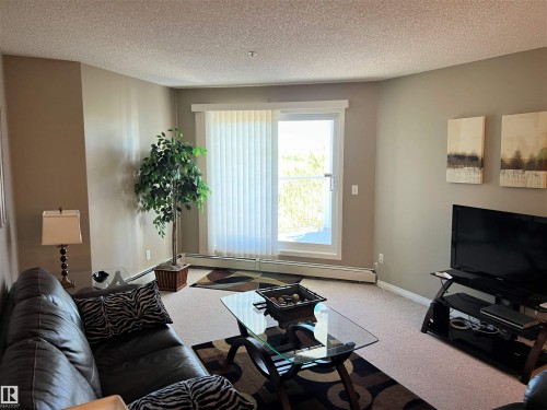 308 9932 100 Avenue, Fort Saskatchewan, AB - Indoor Photo Showing Living Room