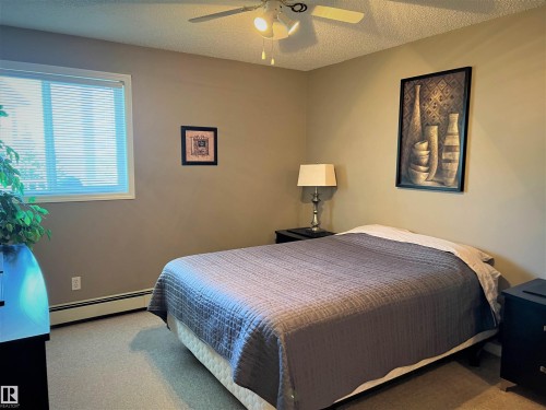 308 9932 100 Avenue, Fort Saskatchewan, AB - Indoor Photo Showing Bedroom