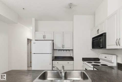 305 8488 111 Street, Edmonton, AB - Indoor Photo Showing Kitchen With Double Sink