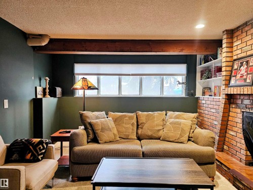127 Grand Meadow Crescent, Edmonton, AB - Indoor Photo Showing Living Room With Fireplace