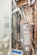 Utility room with gas water heater - 