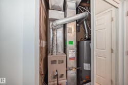 Utilities featuring water heater and heating unit - 