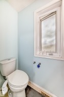 Bathroom with baseboards and toilet - 