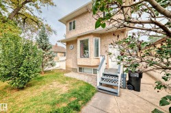 Back of house with stucco siding - 