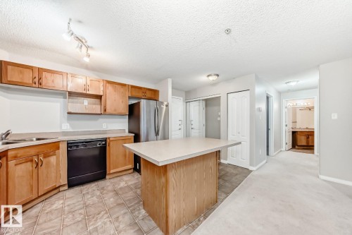 1132 9363 Simpson Drive, Edmonton, AB - Indoor Photo Showing Kitchen With Double Sink