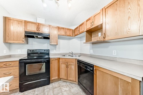 1132 9363 Simpson Drive, Edmonton, AB - Indoor Photo Showing Kitchen With Double Sink