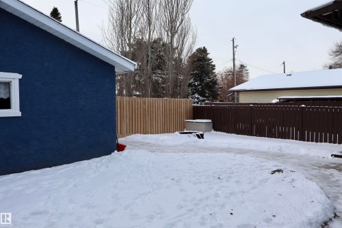 View of yard covered in snow - 4505 58 Avenue, Barrhead, AB - Outdoor
