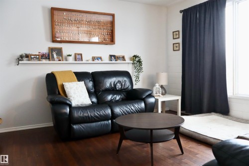 Living area featuring hardwood / wood-style flooring - 4505 58 Avenue, Barrhead, AB - Indoor Photo Showing Living Room