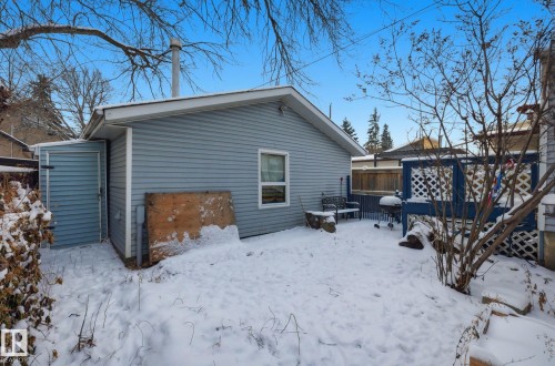 View of snow covered rear of property - 9705 87 Avenue, Edmonton, AB - Outdoor