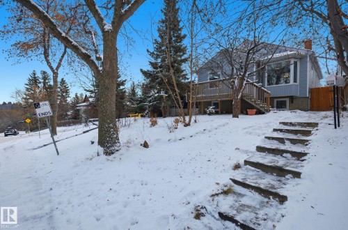 Snowy yard with stairway and a deck - 9705 87 Avenue, Edmonton, AB - Outdoor