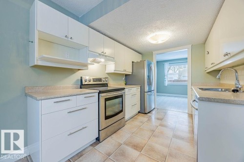 1170 Millbourne Road E, Edmonton, AB - Indoor Photo Showing Kitchen With Double Sink