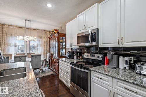 17116 121 Street, Edmonton, AB - Indoor Photo Showing Kitchen With Double Sink